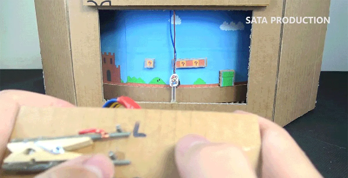 Cần gì TV hay máy NES, bạn có thể sống lại tuổi thơ với game Mario bằng giấy các tông như thế này